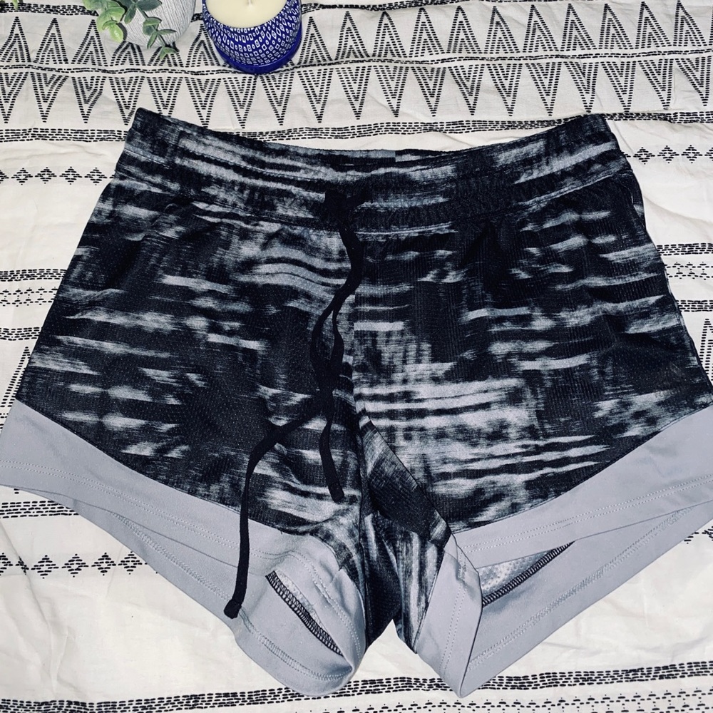 Reebok running shorts size small in color grey